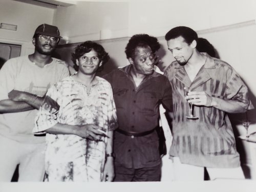 James Baldwin with (from left to right) writers: Caryl Phillips, David Dabydeen, and Fred D&#x27;Aguiar